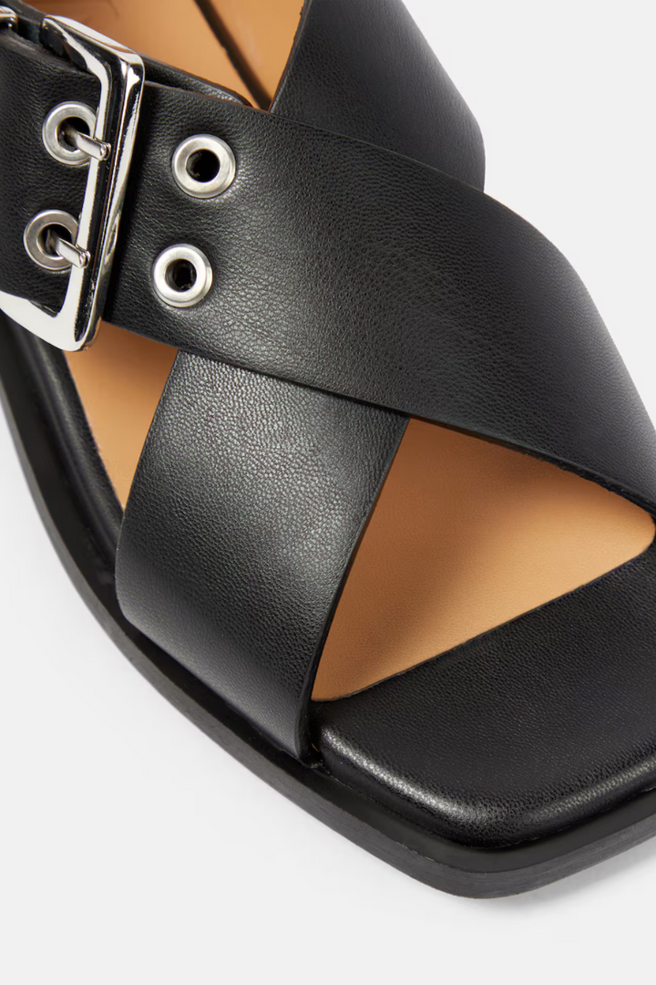 close up of Ganni Feminine Buckles Cross Strap Sandal