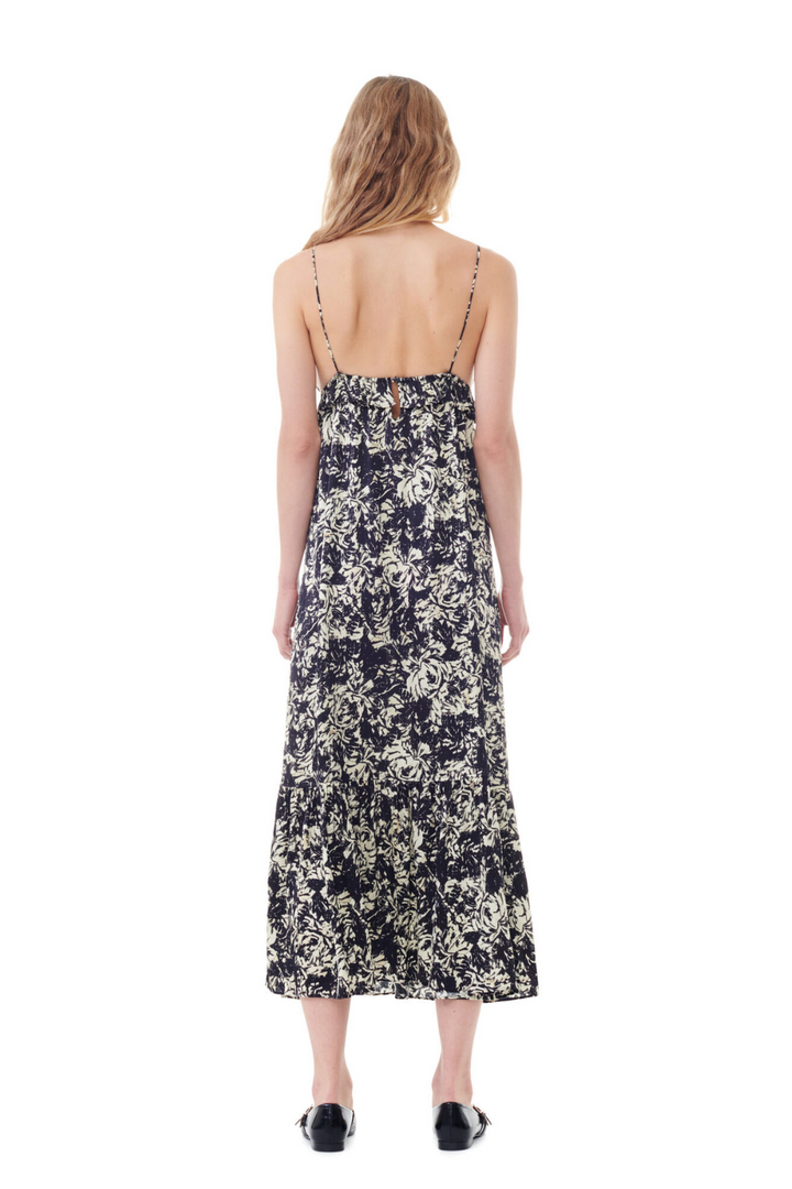 Model wearing Ganni Printed Satin Strap Dress rear view