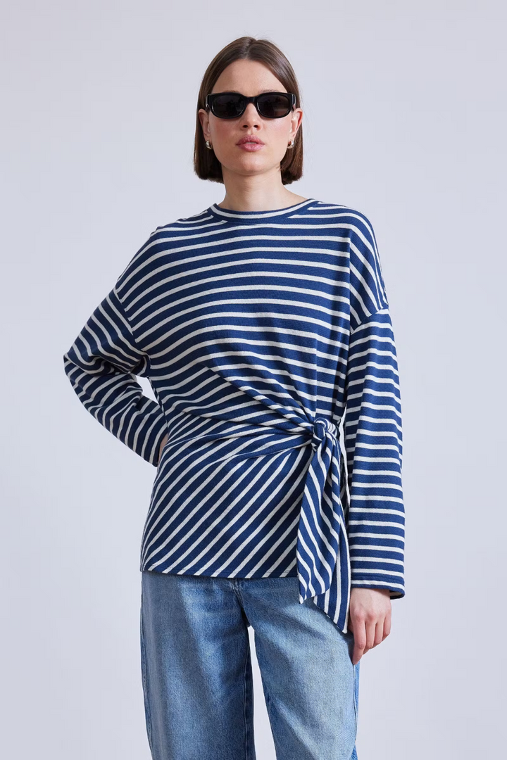 Model wearing Apiece Apart Long Sleeve Vanina Top front view