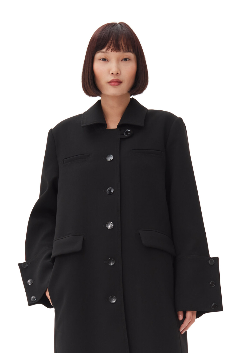 Model wearing Ganni Bonded Crepe Coat front view