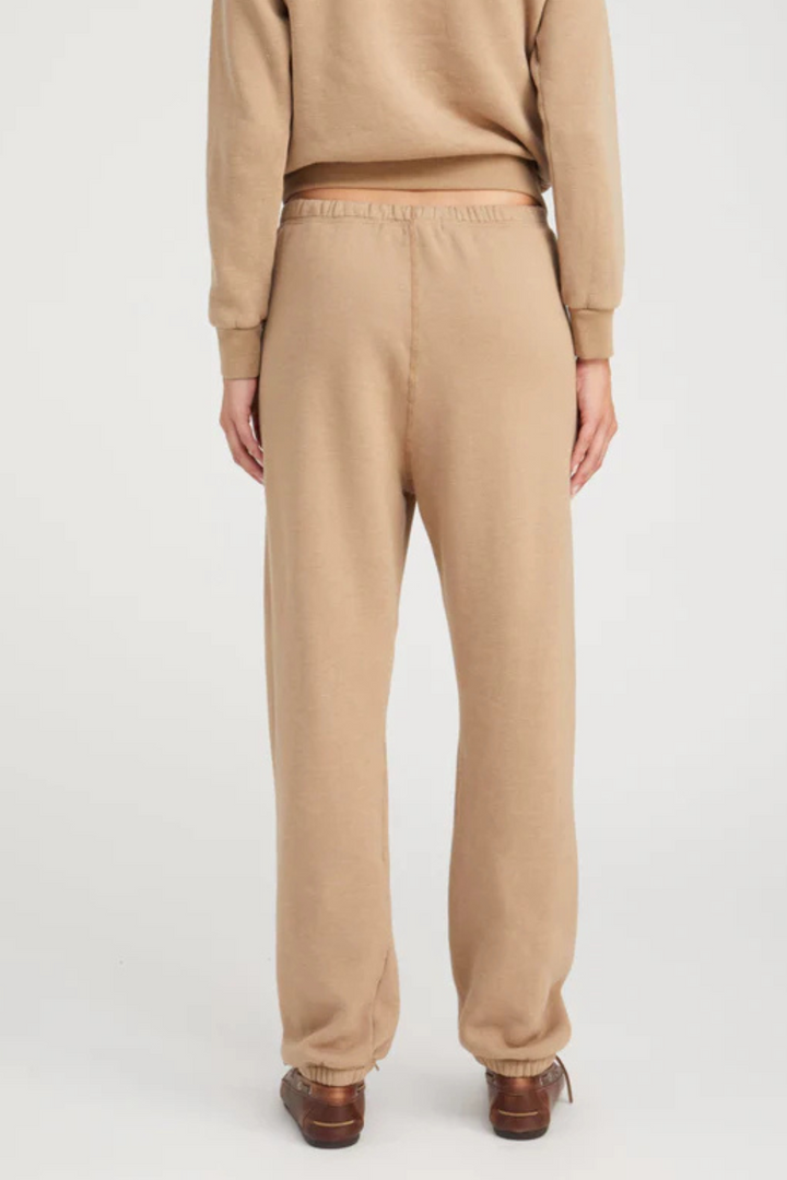 Model wearing SPRWMN Heart Sweatpant Latte White rear view