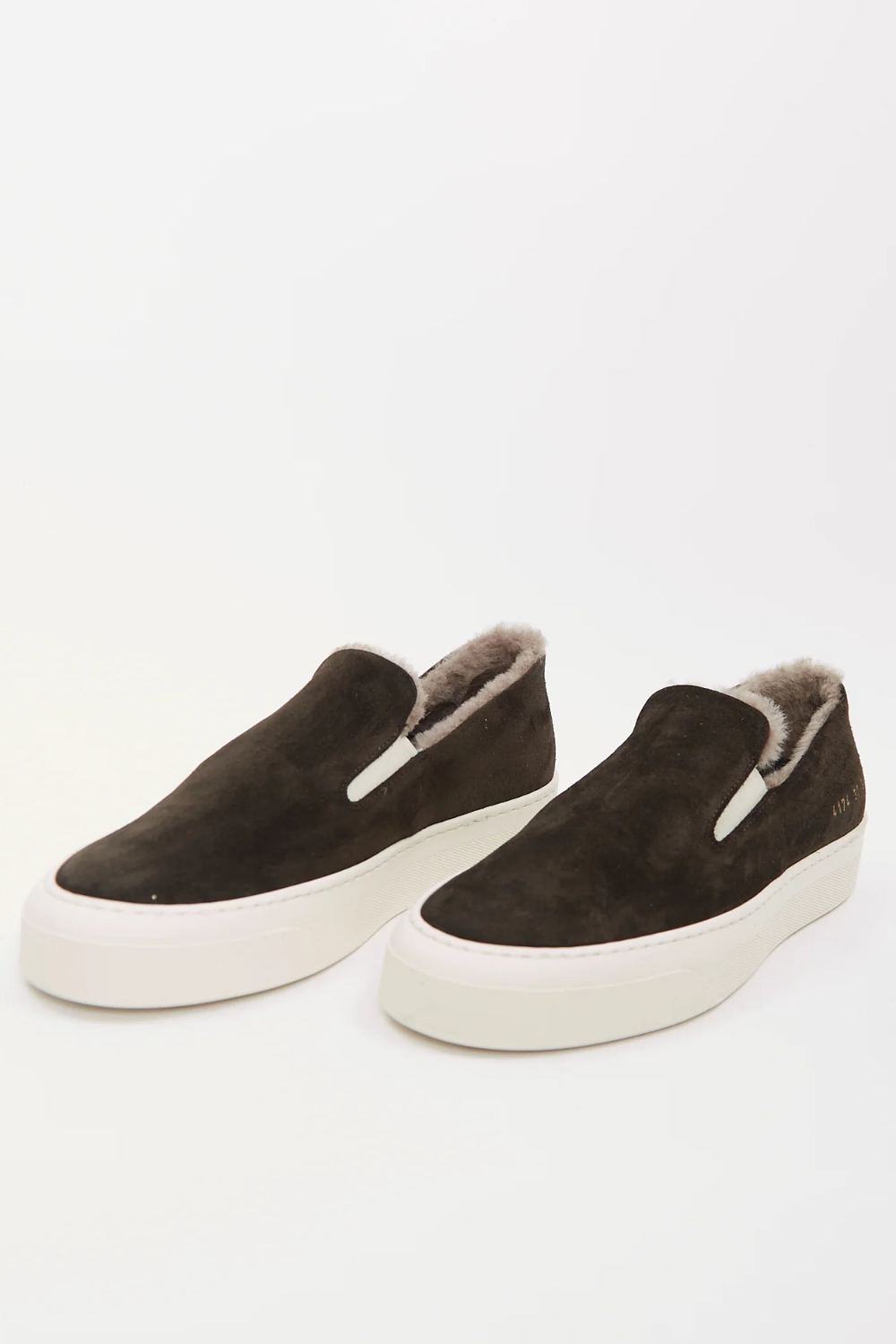 Flat lay of Common Projects Slip On In Suede With Shearling front view