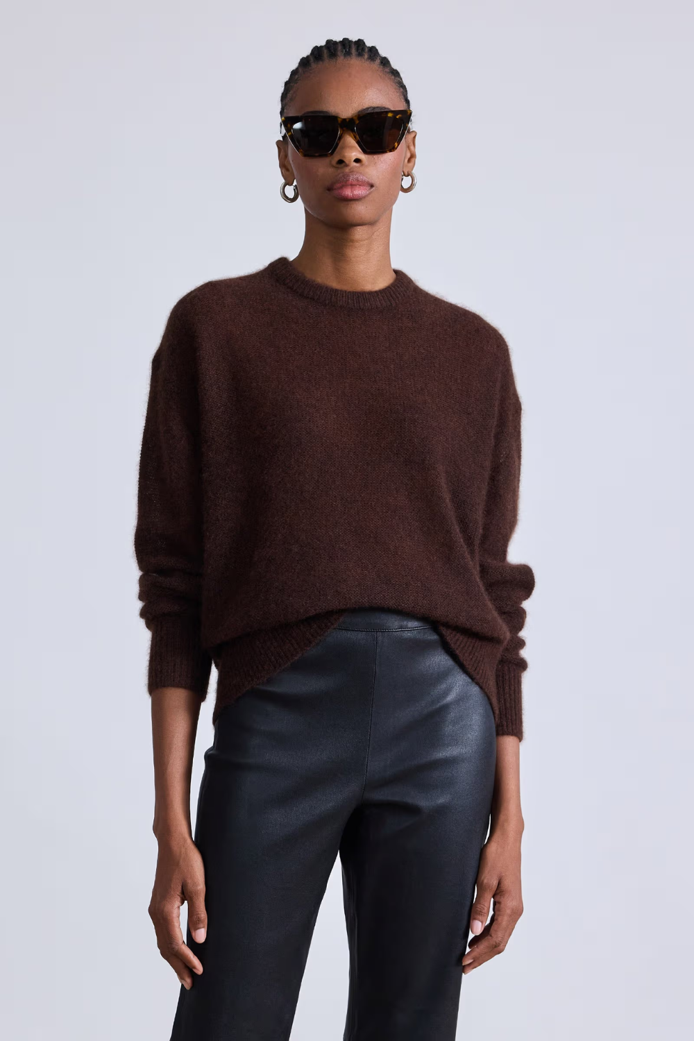 Model wearing Apiece Apart Softest Tissue Weight Sweater front view