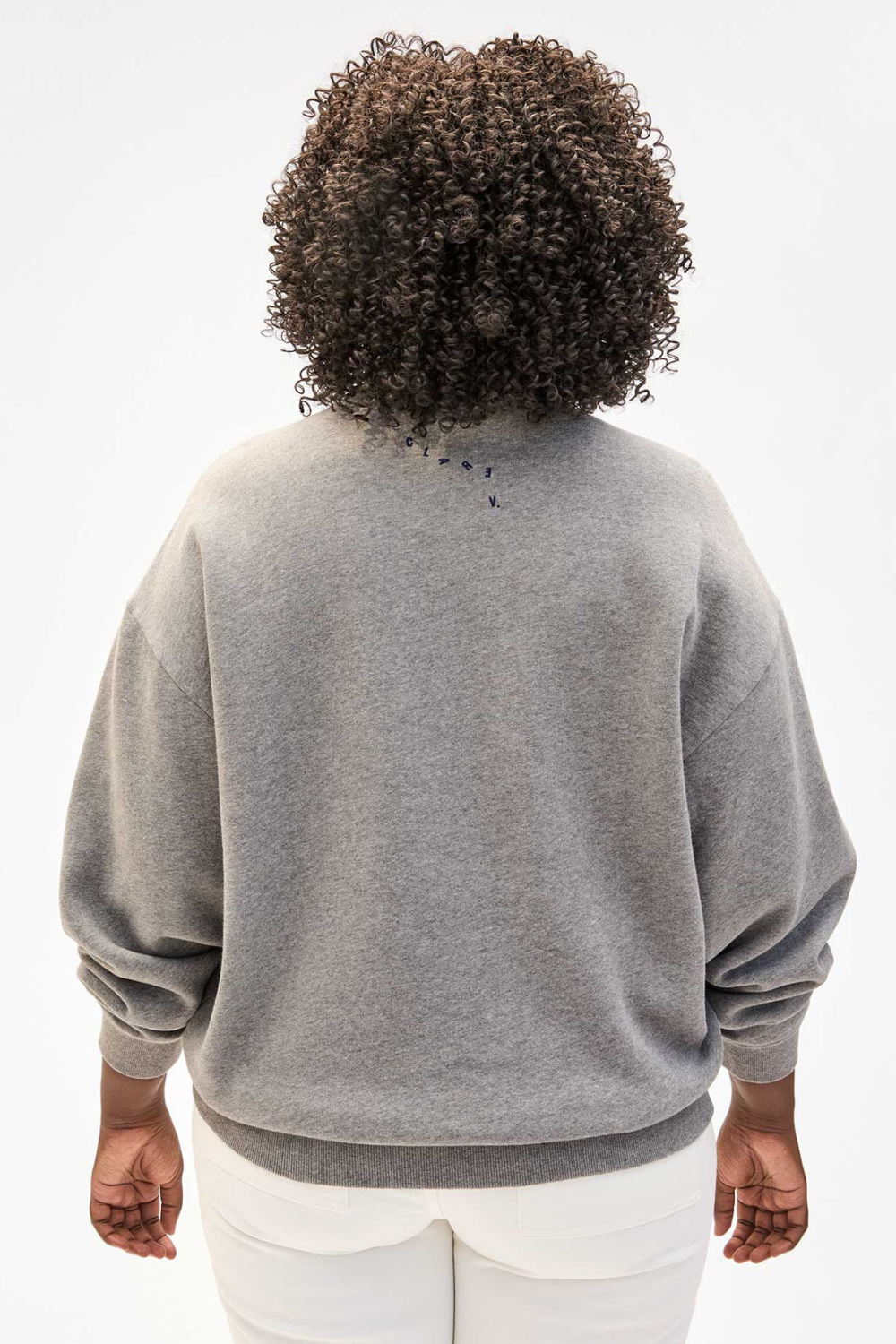 Model wearing Clare V. Oversized Sweatshirt rear view