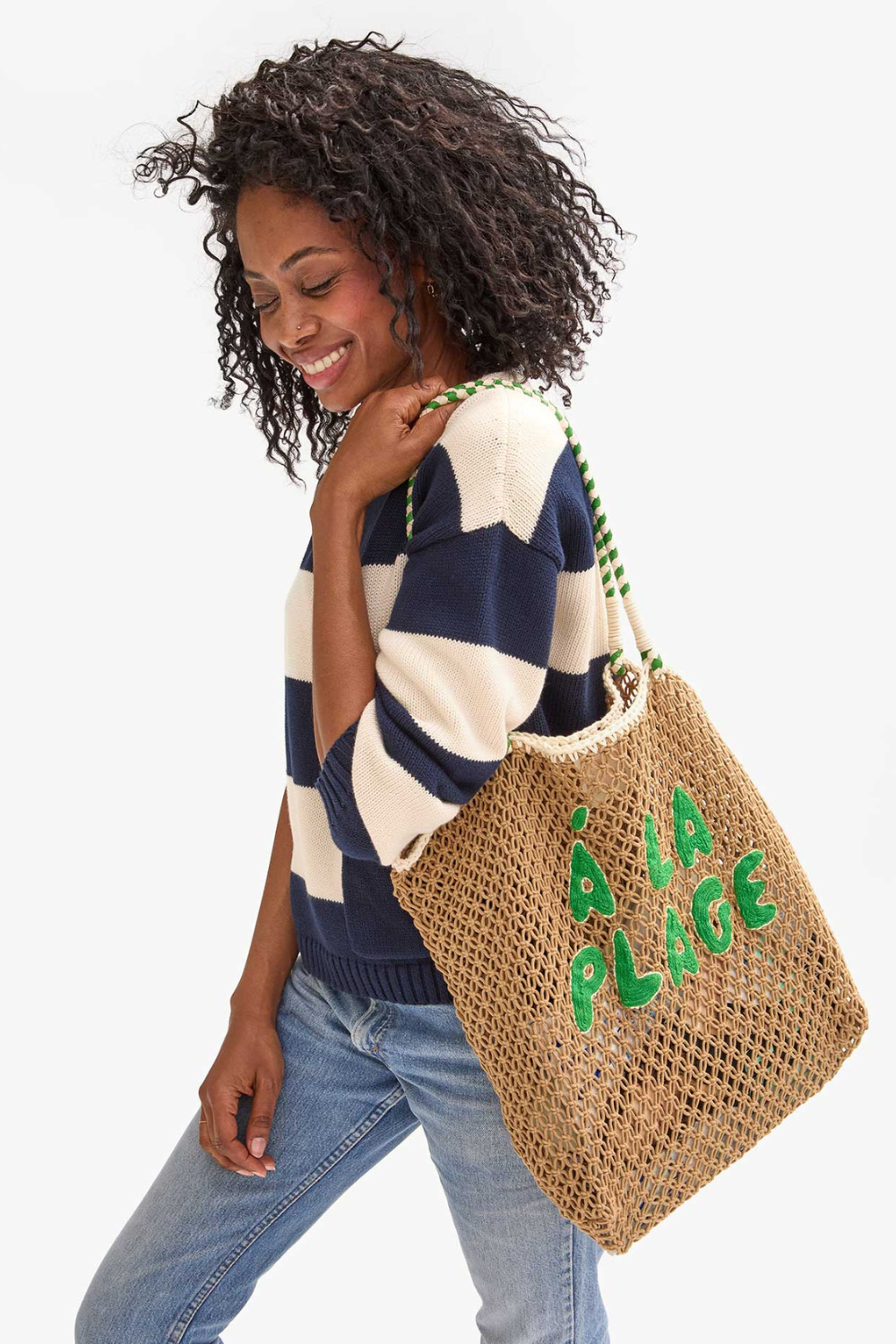 Model wearing Clare V. L'ete Tote front view