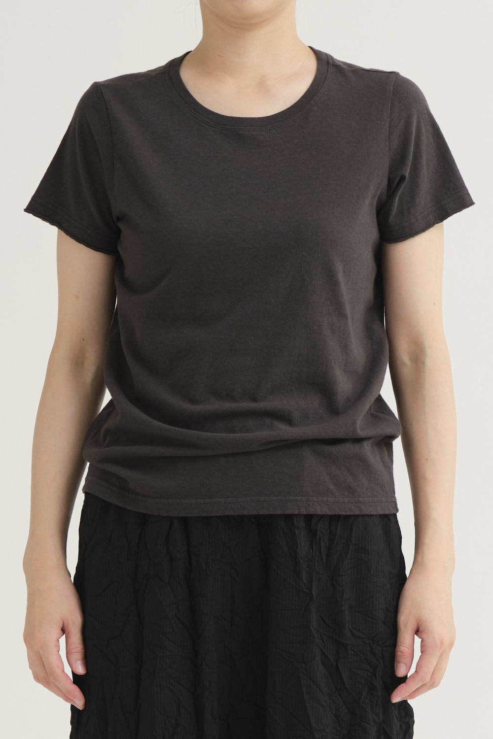 Model wearing Pas de Calais Recycled Cotton Crew Neck T Shirt front view