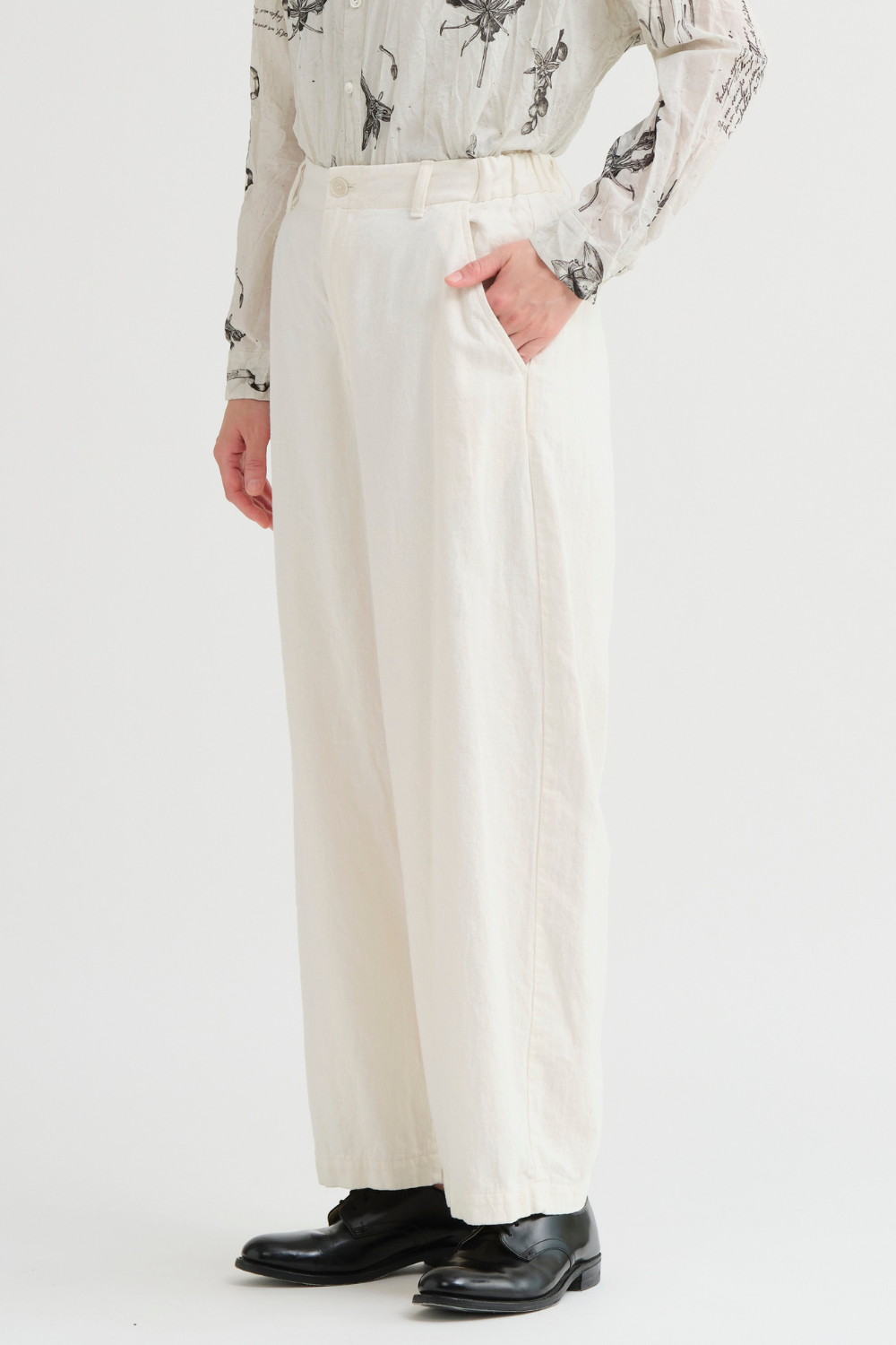 Model wearing Pas de Calais Cotton Linen Satin Wide Pants front/side view