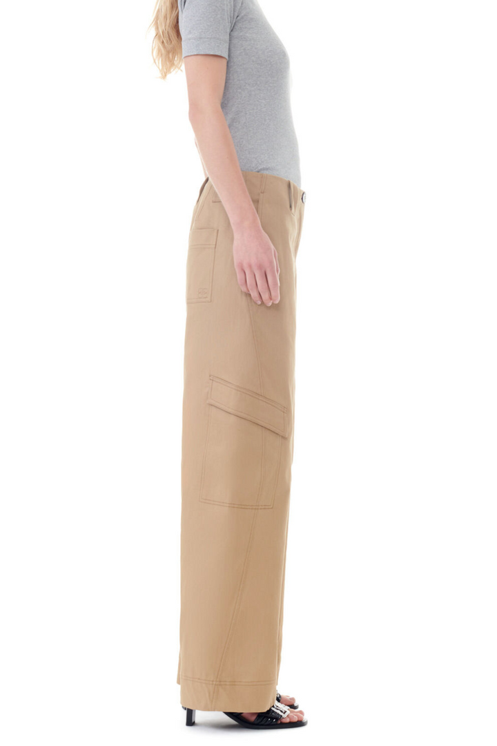 Model wearing Ganni Herringbone Canvas Mid Waist Cargo Pants side view