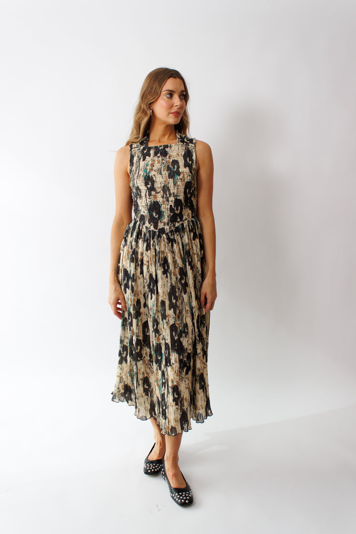 Mari wearing Ganni Printed Pleats Smock Midi Straps Dress front view