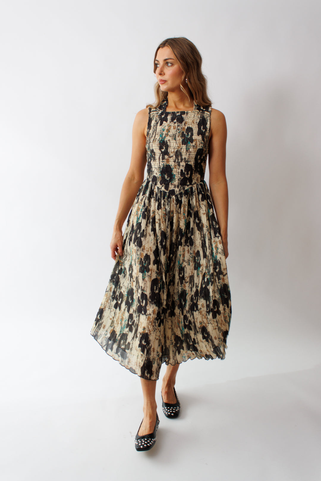 Mari wearing Ganni Printed Pleats Smock Midi Straps Dress front view