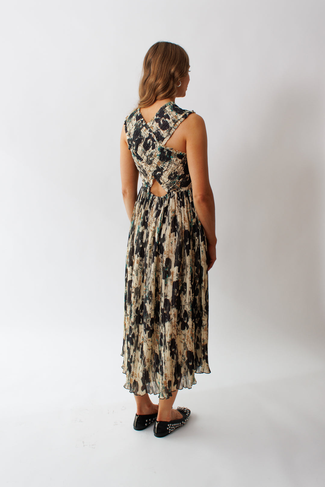 Mari wearing Ganni Printed Pleats Smock Midi Straps Dress rear view