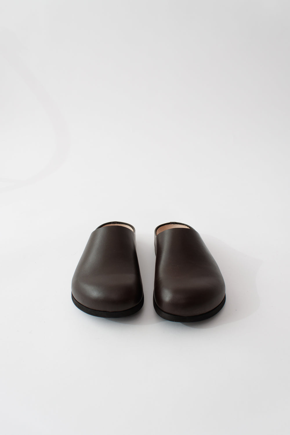 Flat lay of Common Projects Clog In Leather front view