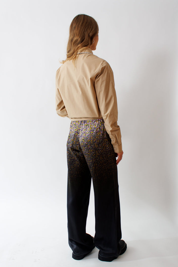 Mari wearing Gradient Background Print Viscose Pant Fade Floral To Black rear view