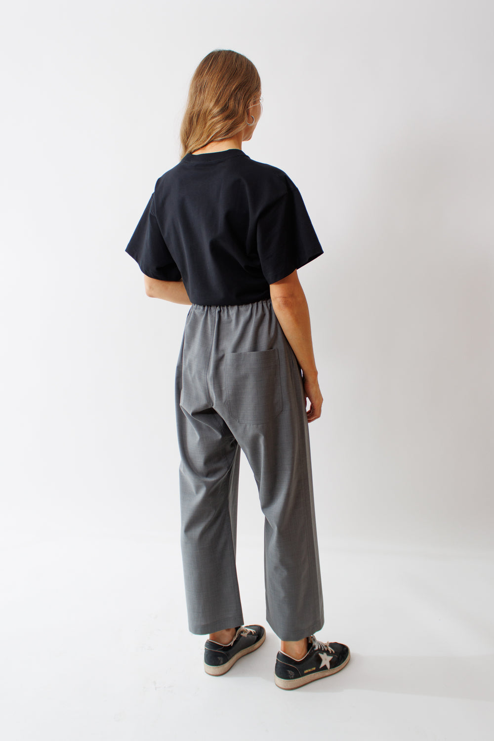 Mari wearing Sofie D'Hoore Pilar Relaxed Woven Low Crotch Pant rear view