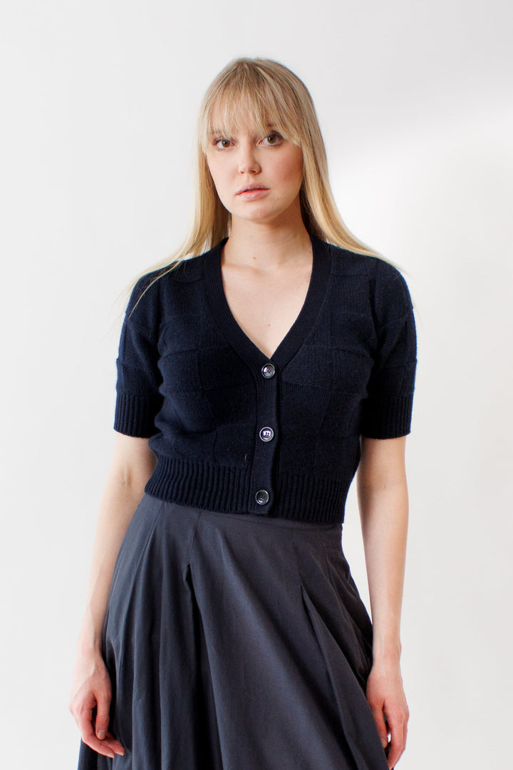 Bailey wearing Allude Cotton Cashmere Woven Check V Cardigan front view 