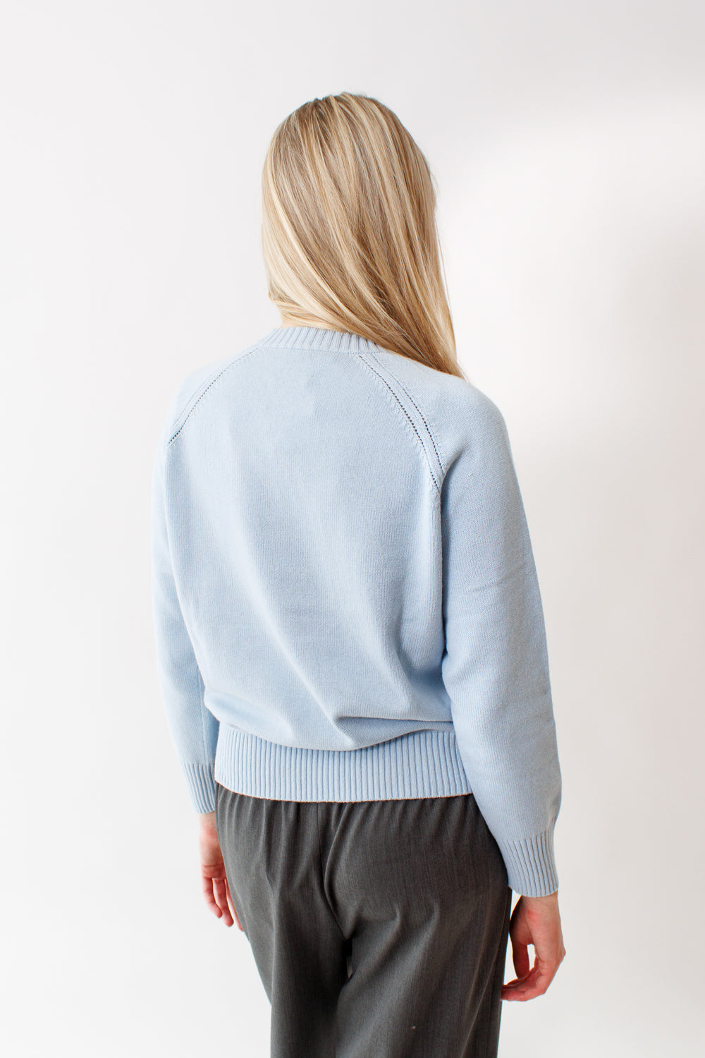 Bailey wearing Allude Cotton Cashmere RD Crew Sweater rear view