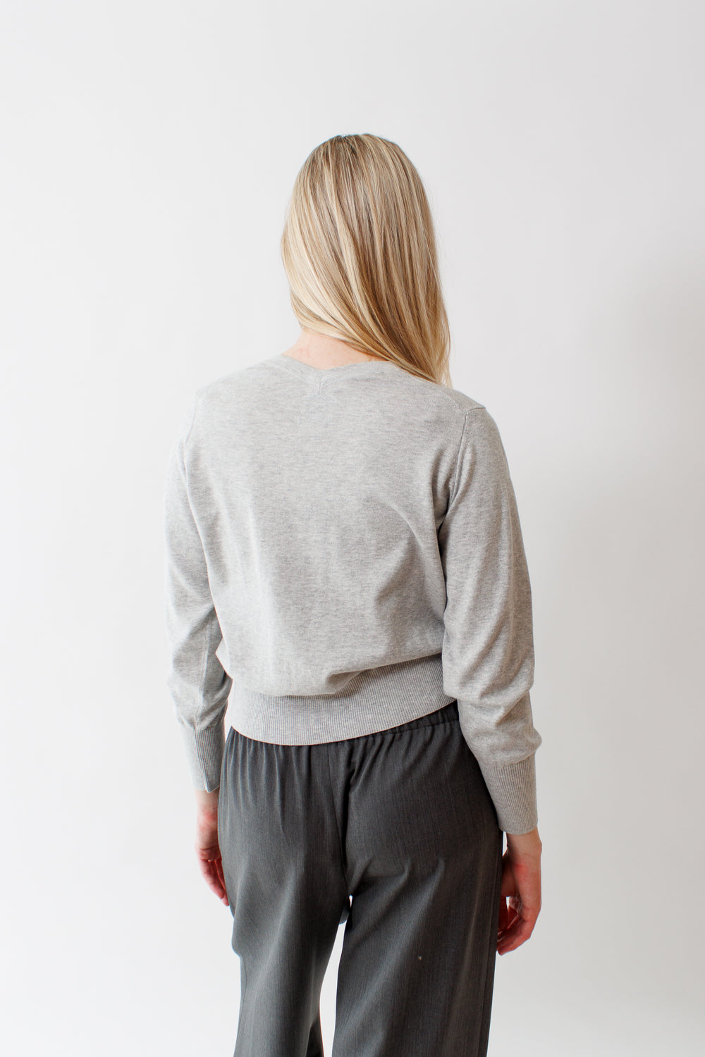 Bailey wearing Allude Cotton Silk Cashmere Double V Sweater rear view