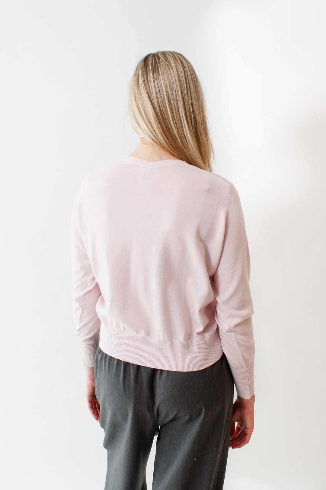 Bailey wearing Allude Cotton Silk Cashmere Double V Sweater rear view 