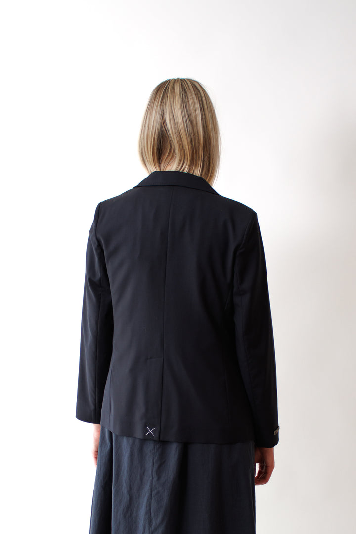 Bailey wearing Peserico Loro Piana Tropical Worsted Merino Wool Blazer rear view