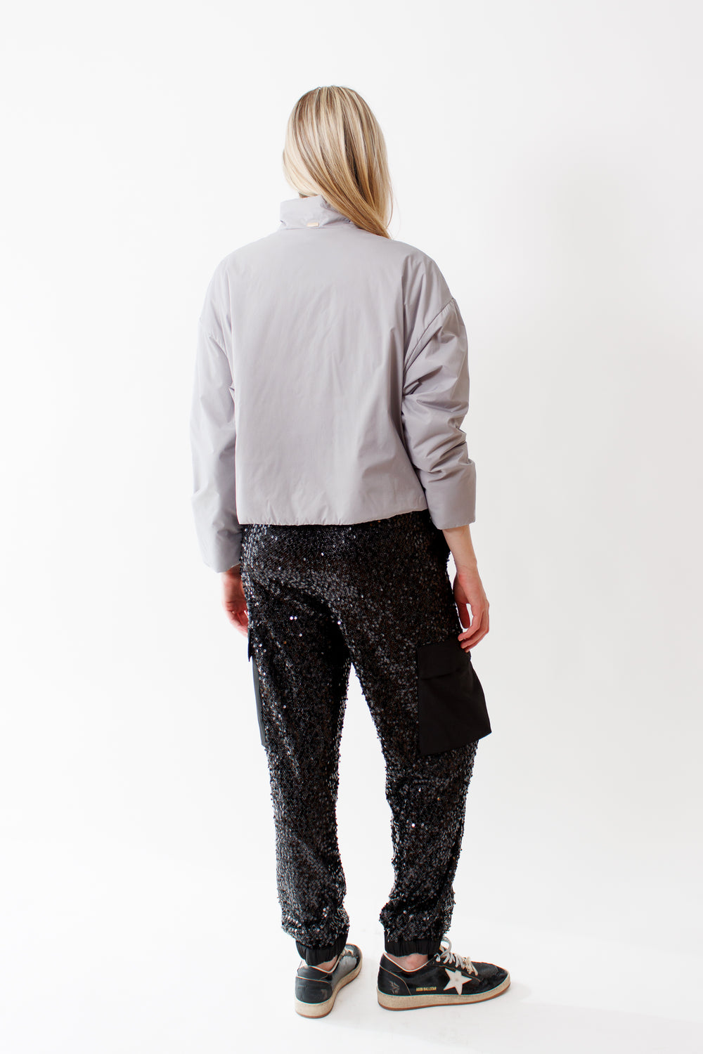 Bailey wearing Herno Paillettes Mesh Cargo Pants rear view 