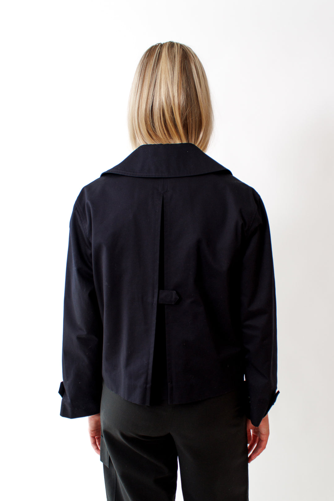 Bailey wearing WE-AR4 The Burb Jacket rear view