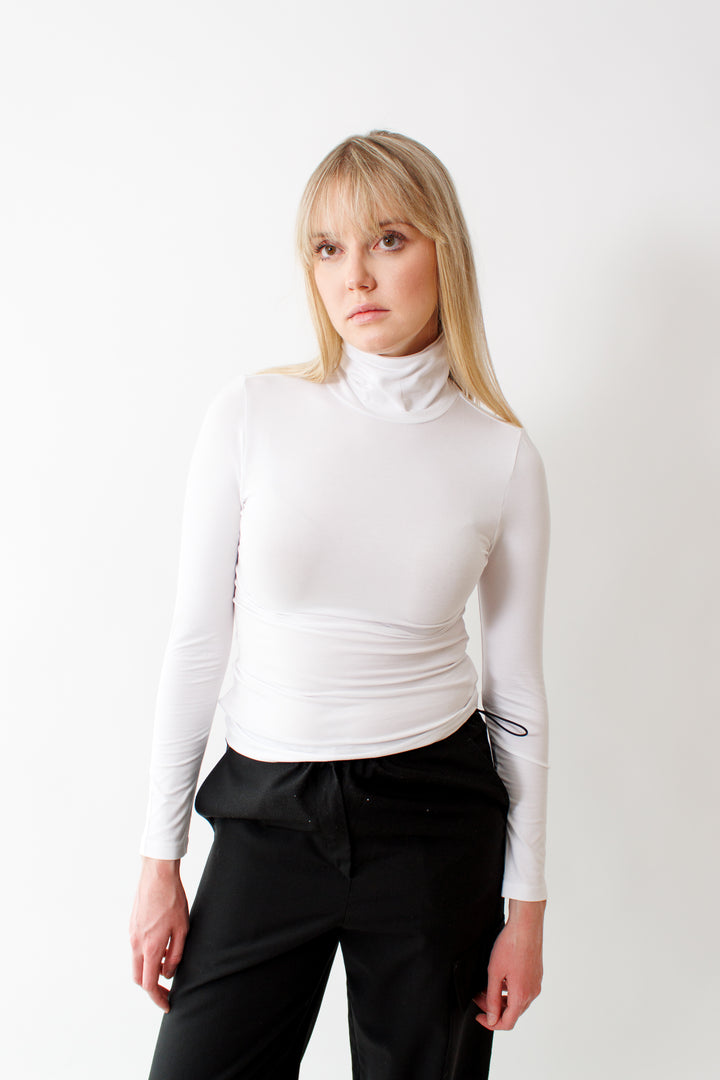 Bailey wearing Lilla P Pima Cotton Spandex Turtleneck Top front view