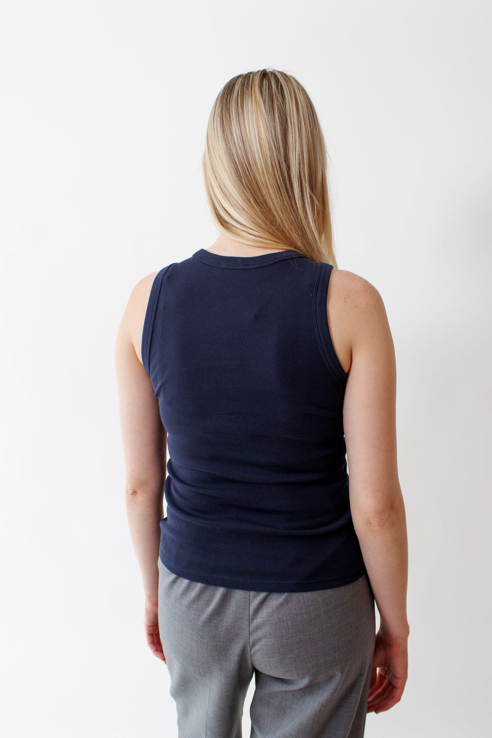 Bailey wearing Lilla P Jewel Tank rear view