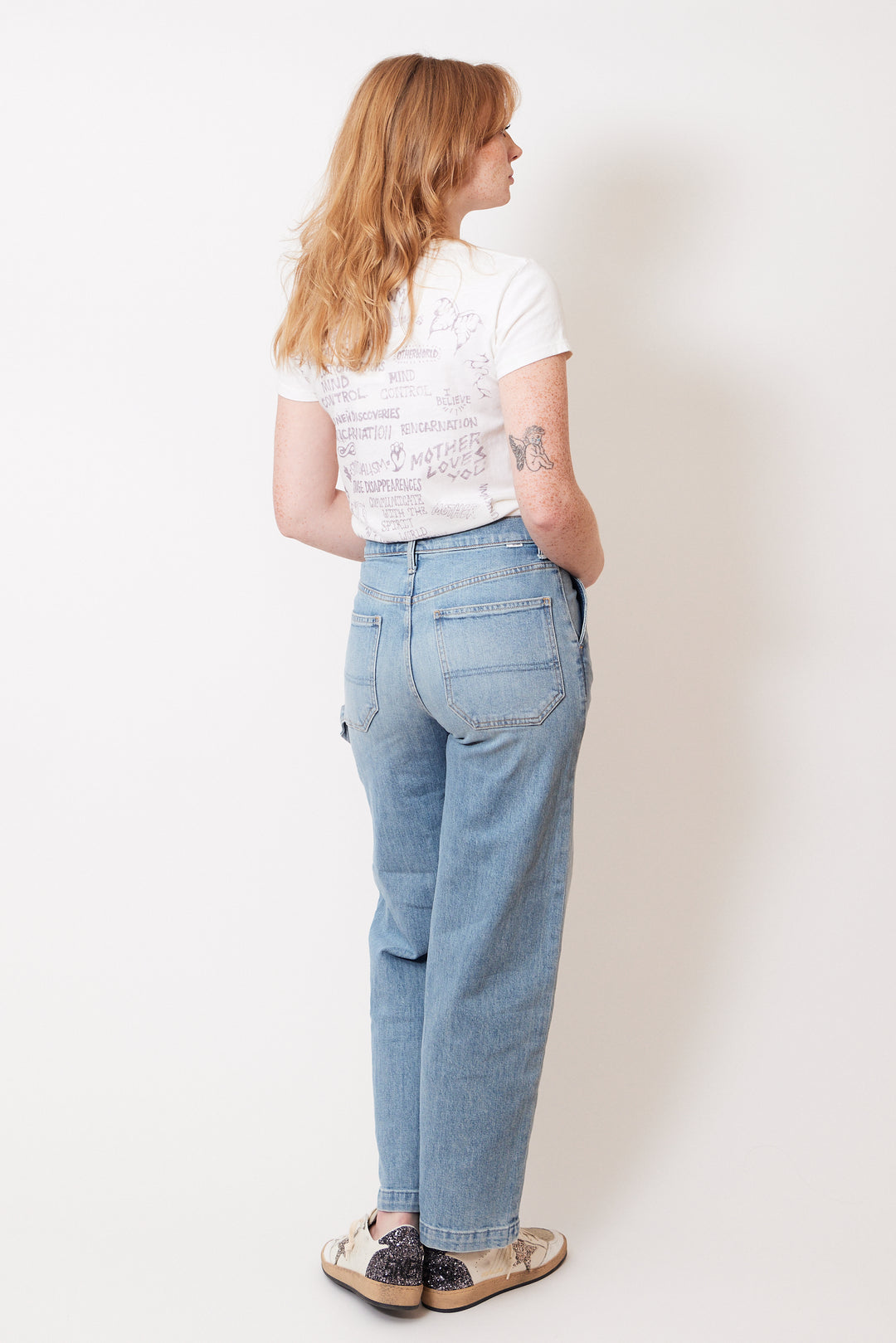 Waverly wearing Mother Denim The Stud Finder Flood rear view