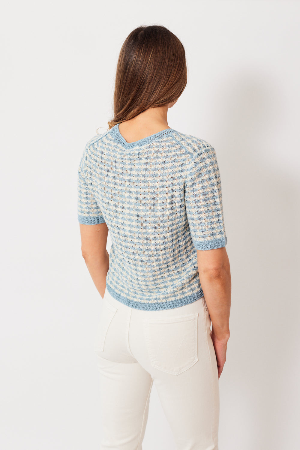 Mari wearing White + Warren Classic Linen Crochet Trim Cardigan Top rear view