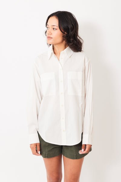 Manda wearing Apiece Apart Classic Button Up front view