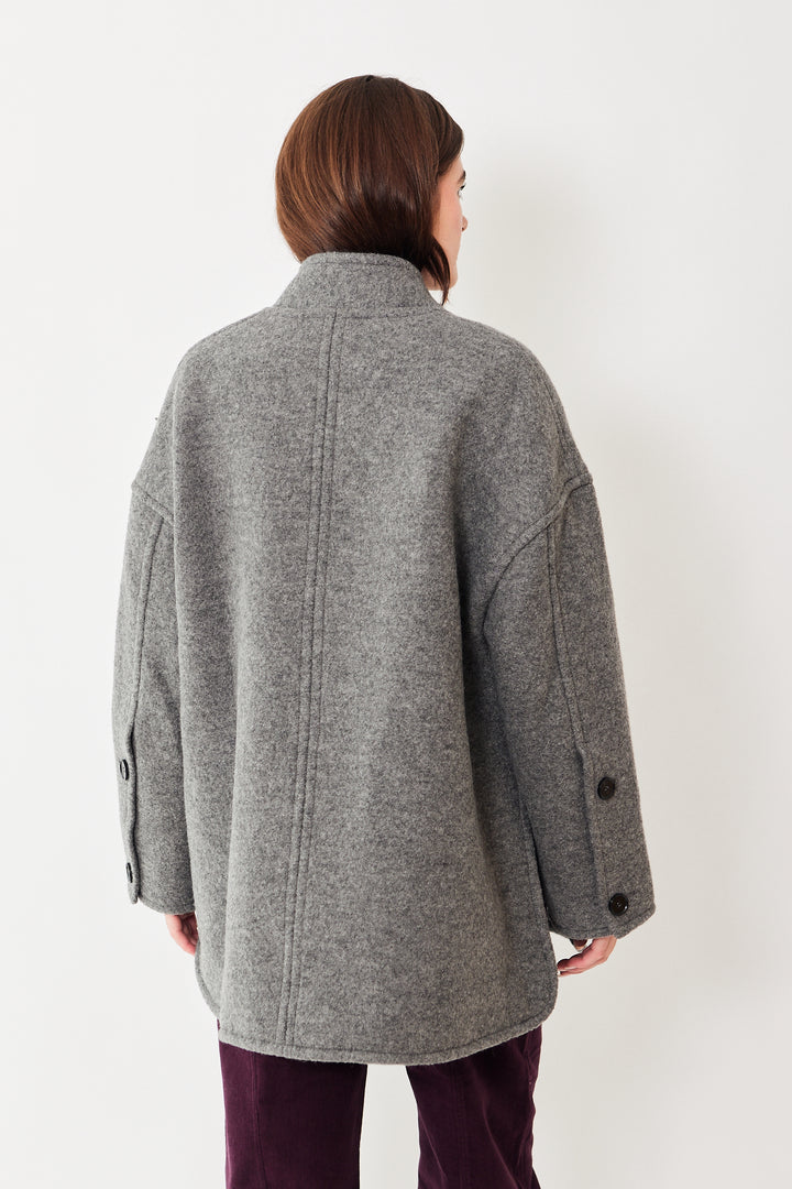 Julia wearing Apiece Apart Vashti Button Sleeve Jacket rear view