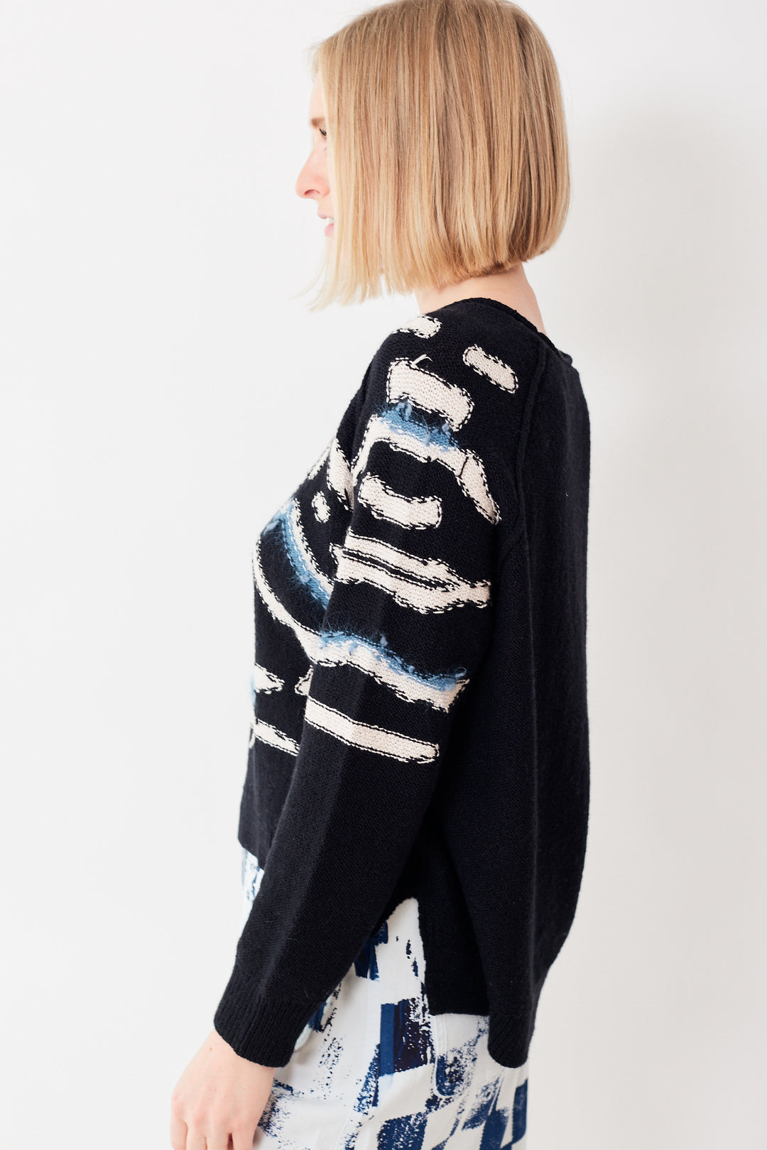 Madi wearing Raquel Allegra Zuri Pullover side view