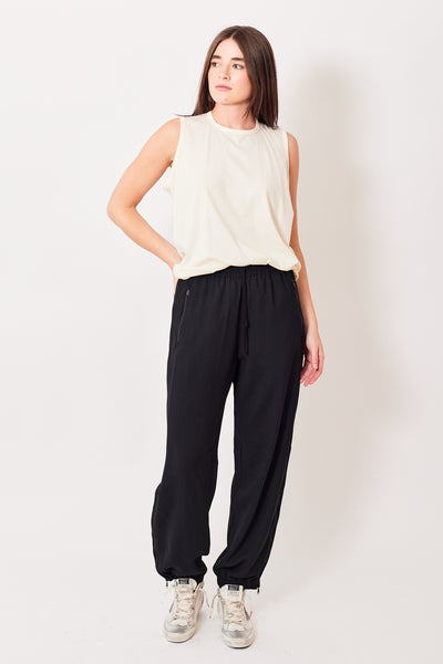 Julia wearing 6397 Tailored Warm-Up Pant front view