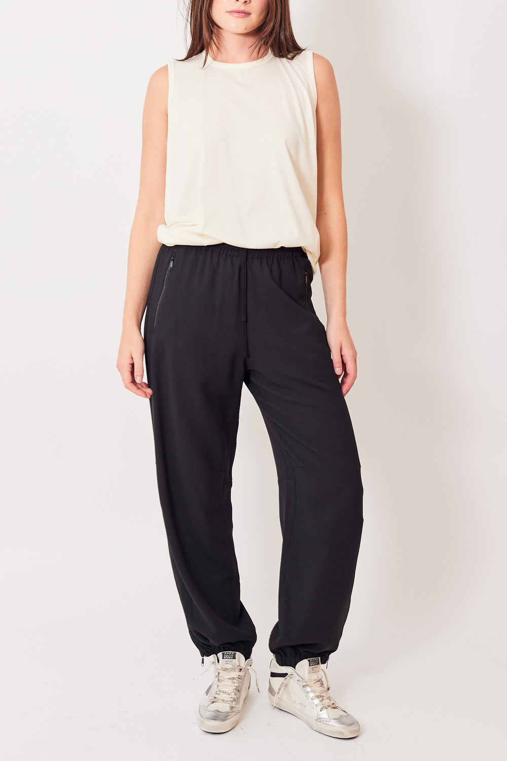 Julia wearing 6397 Tailored Warm-Up Pant front view