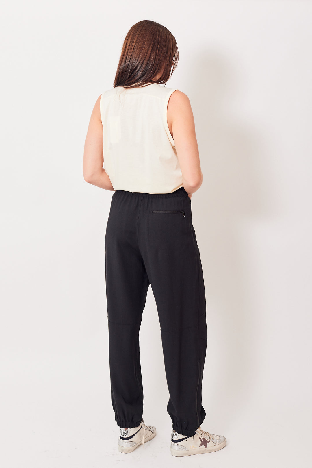 Julia wearing 6397 Tailored Warm-Up Pant rear view