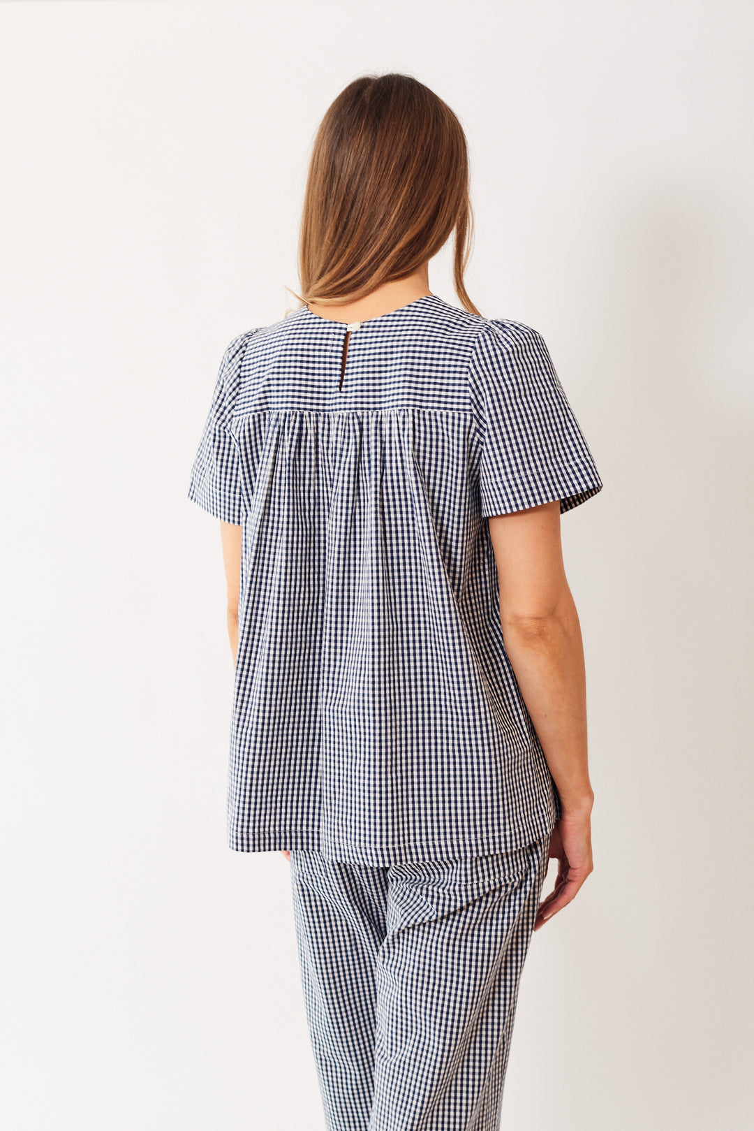 Mari wearing Fabiana Pigna Suni Blouse rear view