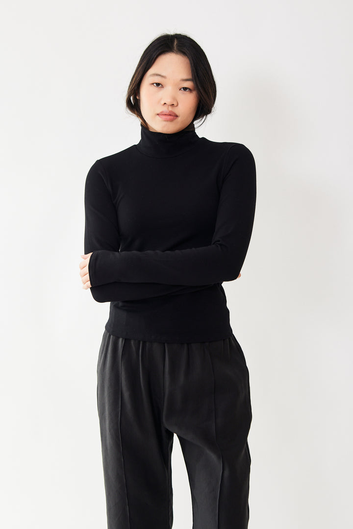 Madelyn wearing SPRWMN Long Sleeve Turtleneck front view