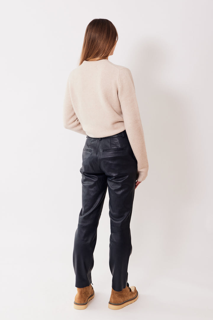 Mari wearing SPRWMN Sophia Cigarette Trousers rear view