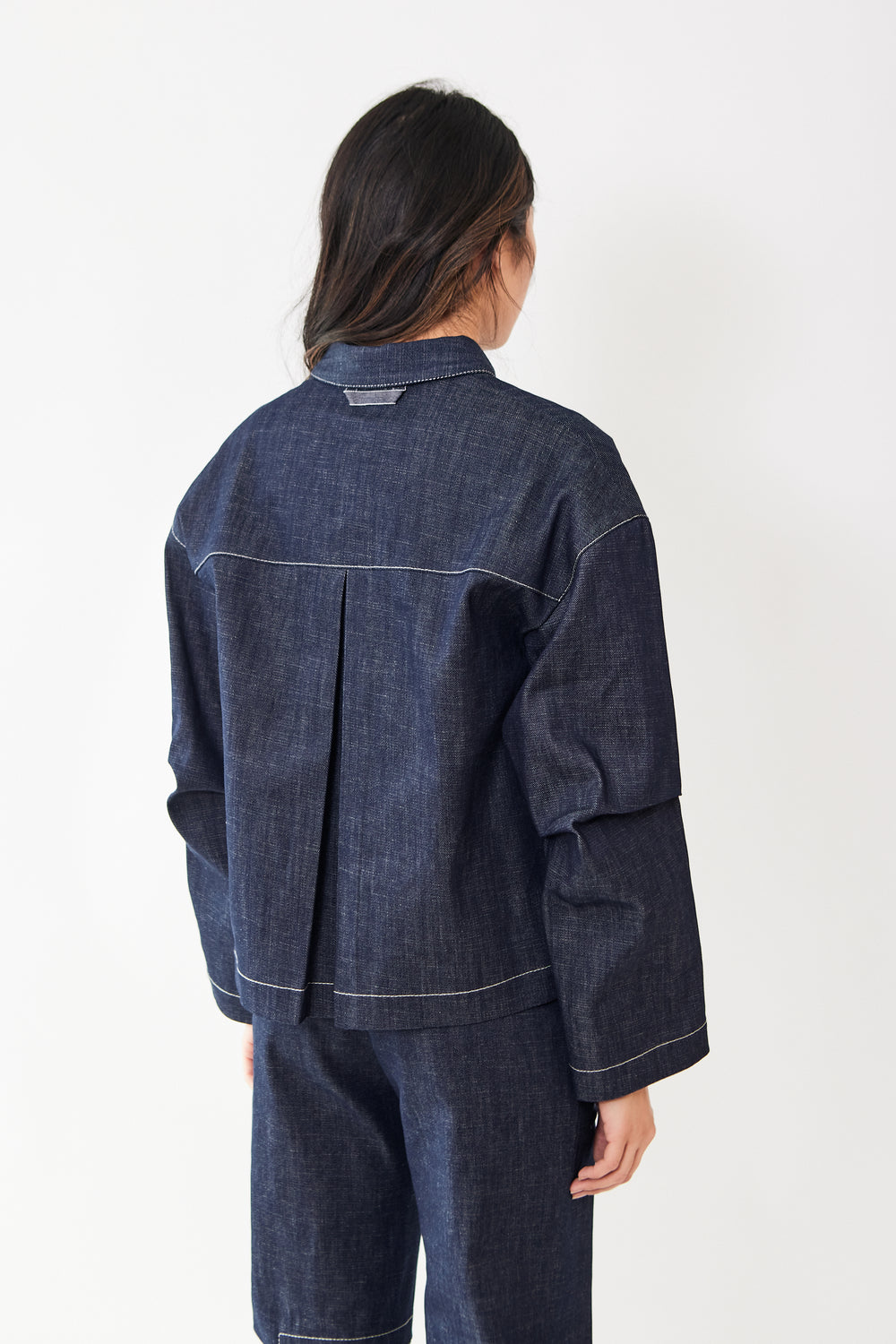 Madelyn wearing Zero + Maria Cornejo Eco Denim Biker Shirt rear view