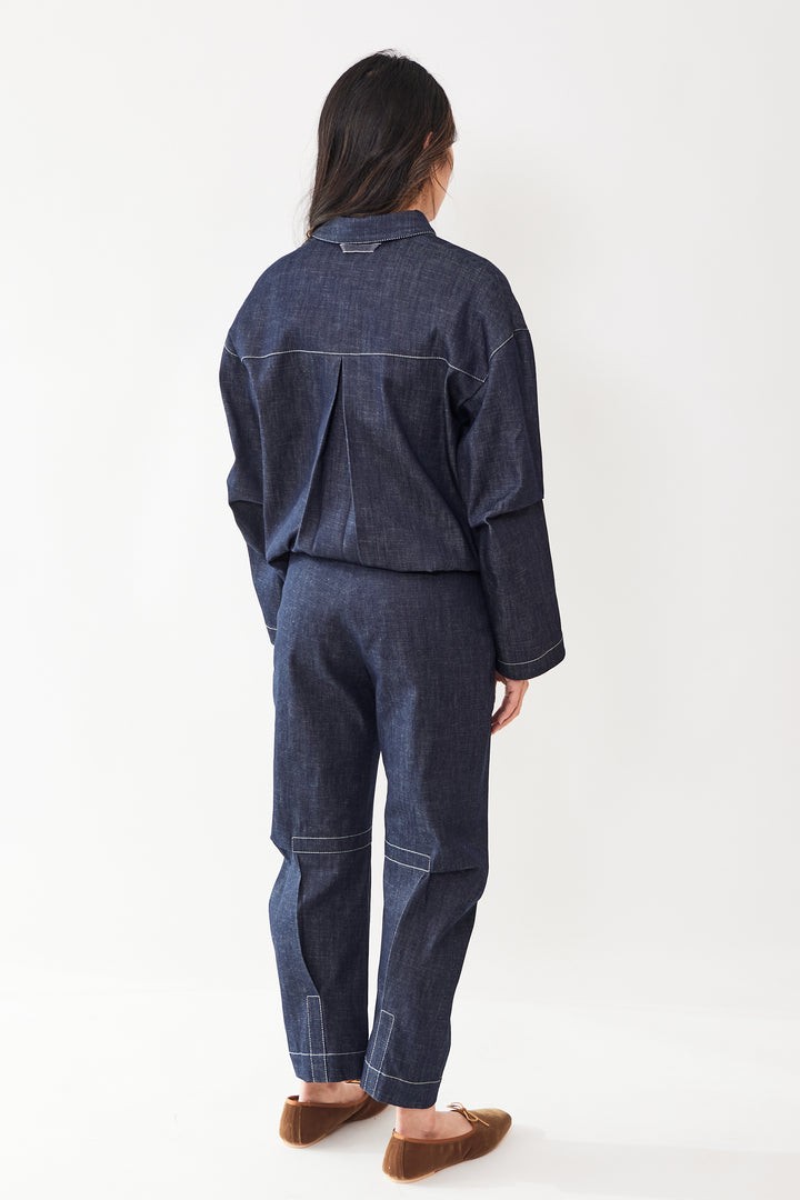 Madelyn wearing Zero + Maria Cornejo Eco Denim Biker Pant rear view