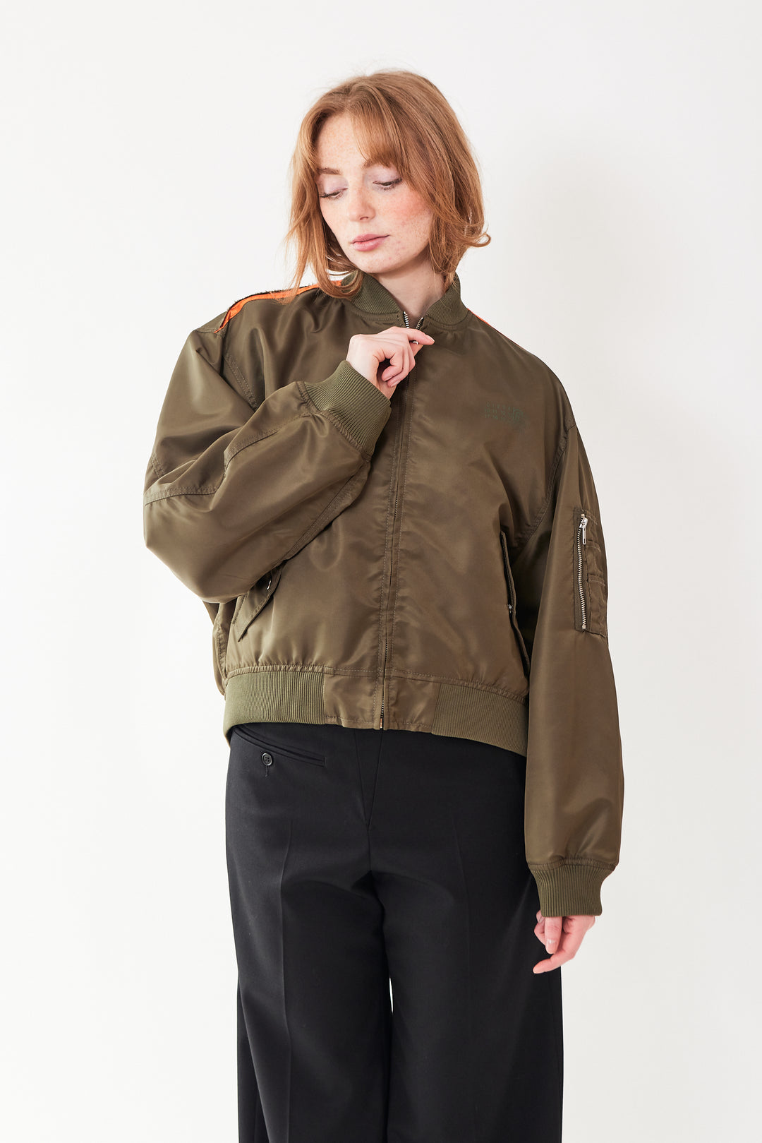 Waverly wearing MM6 Maison Margiela Toggle Parachute Back Bomber Jacket front view