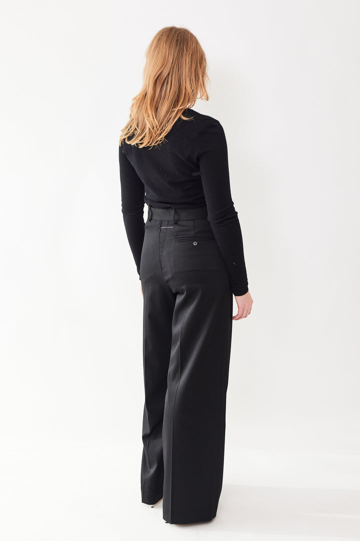 Waverly wearing MM6 Maison Margiela Tailoring Wool Side Zip Half Turn Trouser rear view