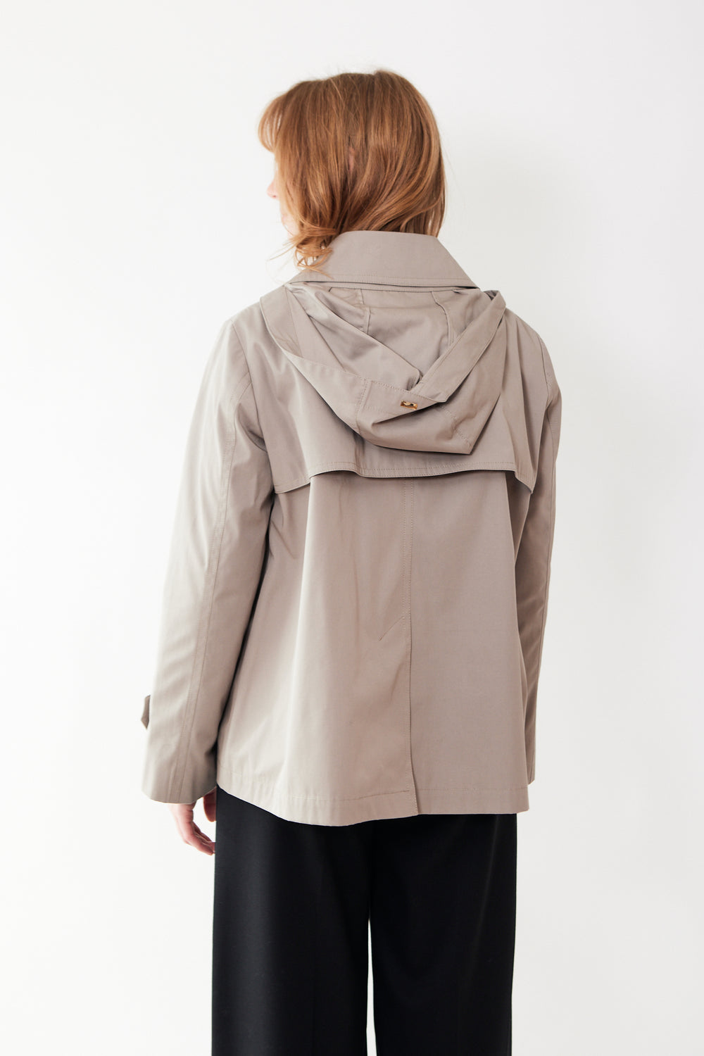 Waverly wearing Herno Cotton Short Trench With Hood And Bell Sleeves rear view