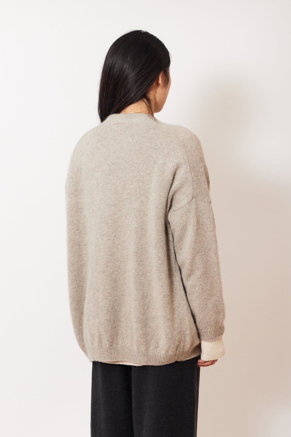 Madelyn wearing Evam Eva Wool Fox Cardigan rear view