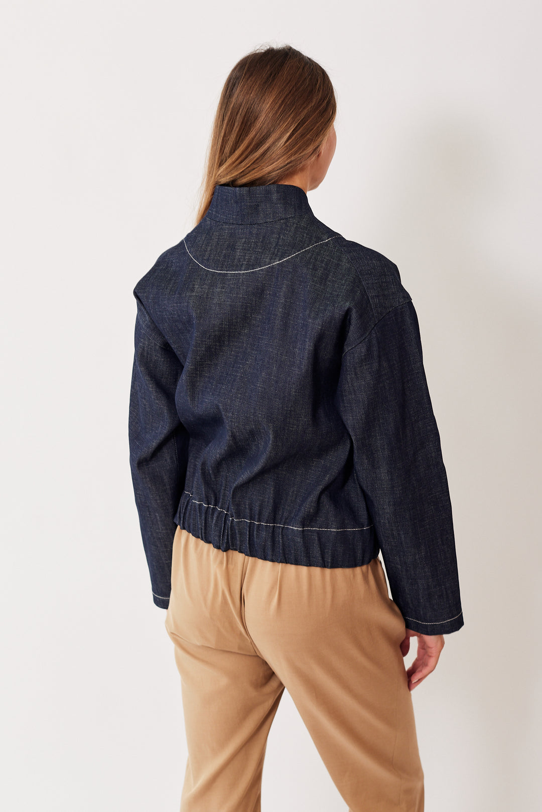 Mari wearing Zero + Maria Cornejo Long Sleeved Eco Denim Edi Bomber rear view