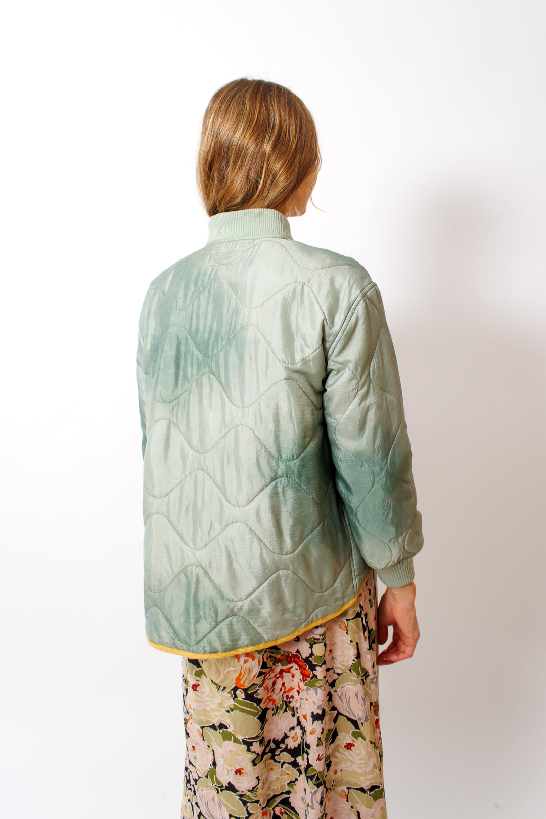 Mari wearing The Great The Quilted Liner Jacket rear view 