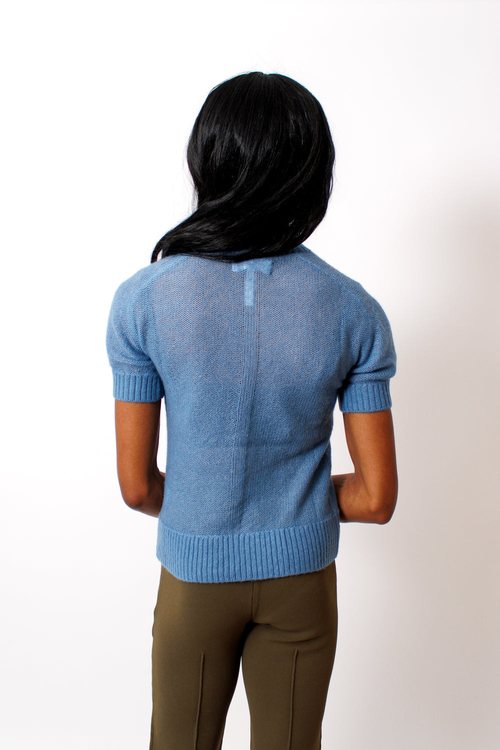 Ja'mes wearing Apiece Apart Softest Silk Cashmere Tee rear view