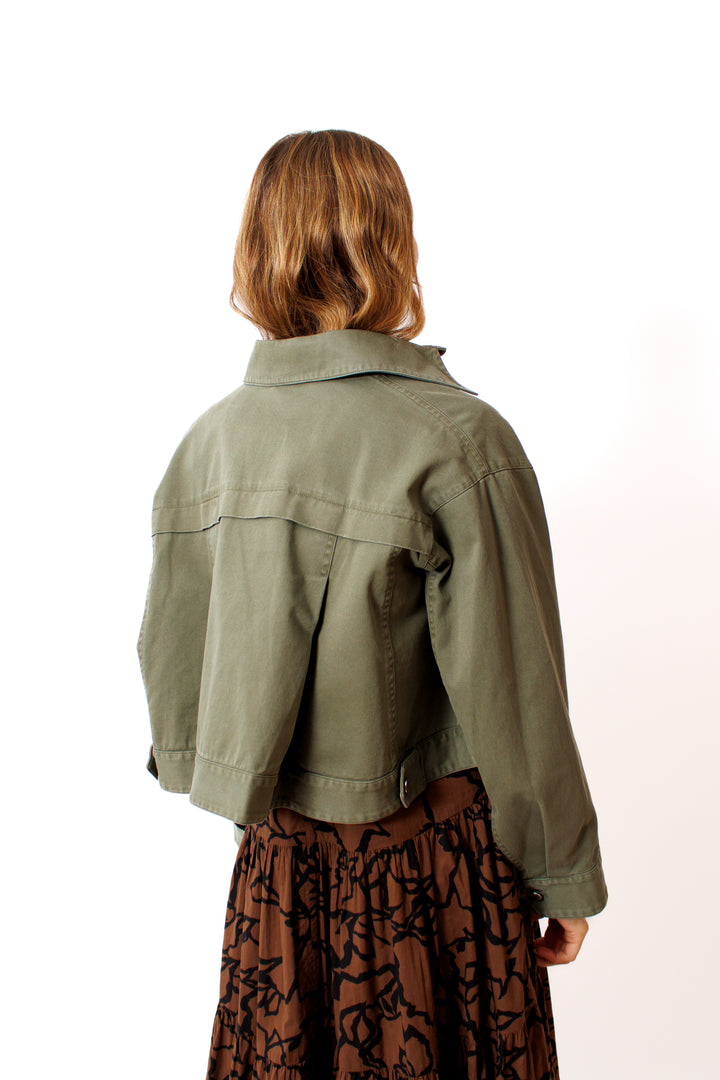 Mari wearing Apiece Apart Cropped Trapeze Jacket rear view