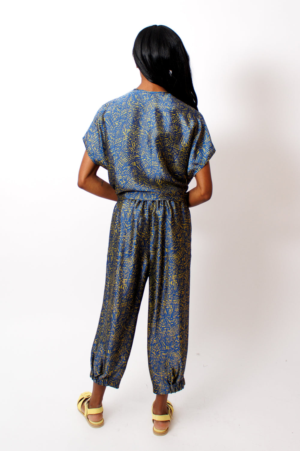 Ja'mes wearing Zero + Maria Cornejo Crosshatch Jacquard Abi Pant rear  view