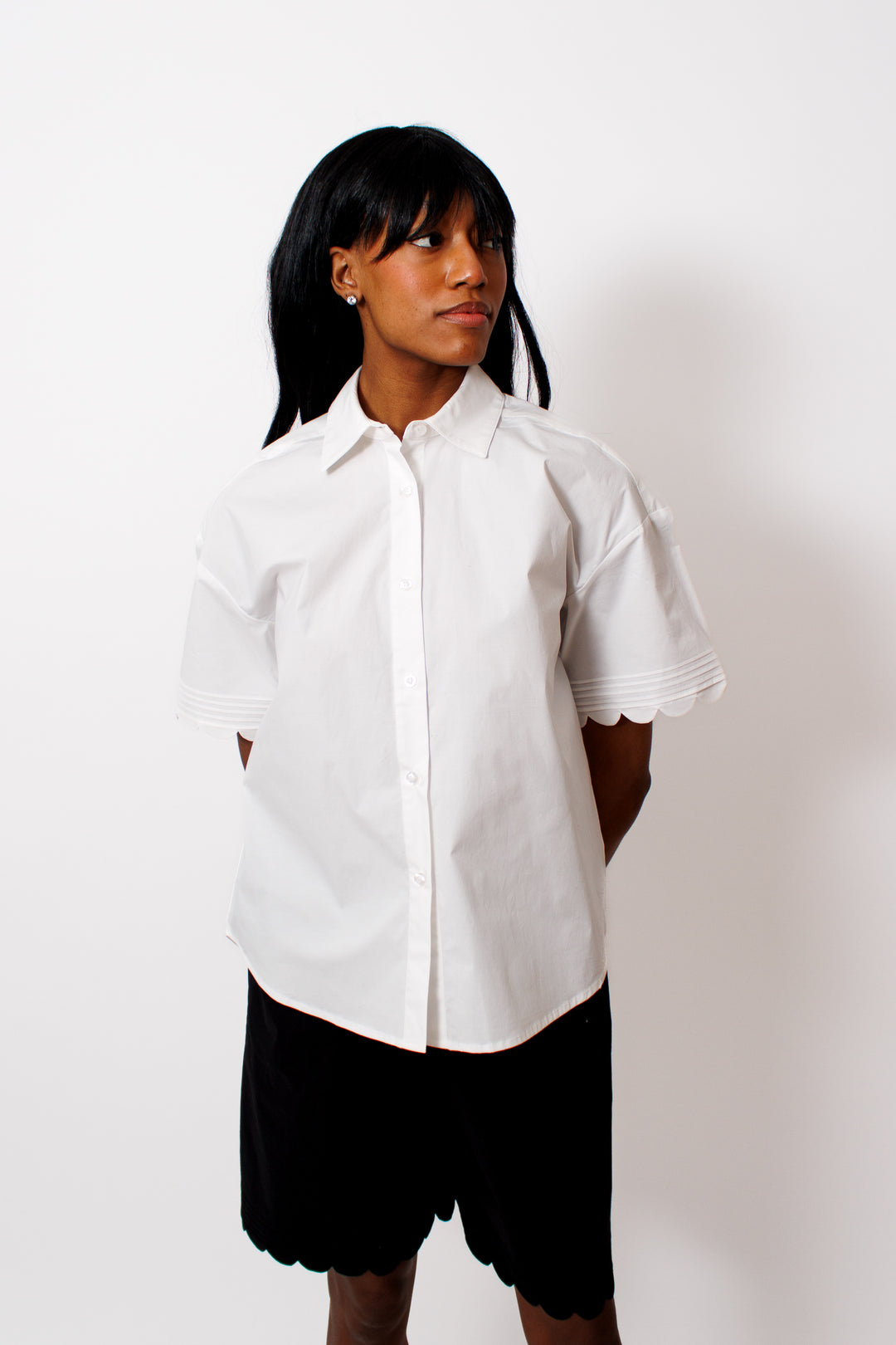 Ja'mes wearing The Garment Cyprus Scallop Shirt front view 